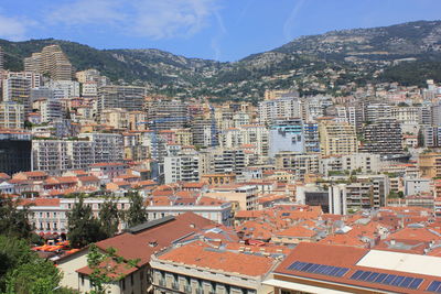 Aerial view of residential district against sky