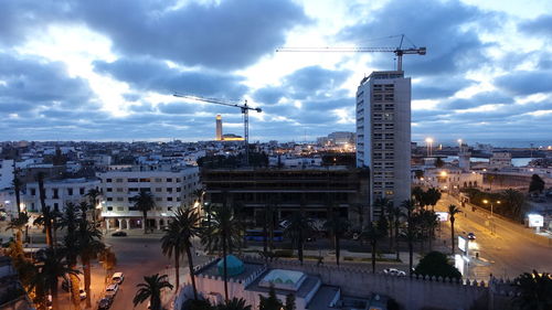 High angle view of buildings in city against sky