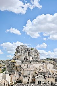 High angle view of church carved in rock  against sky