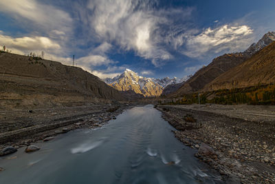 Panoramic view of snowcapped mountains against sky