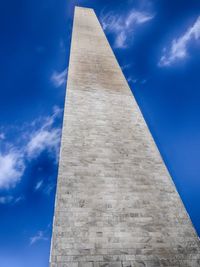 Low angle view of built structure against blue sky