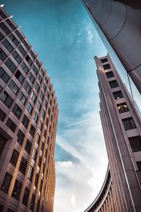 Low angle view of modern buildings against sky