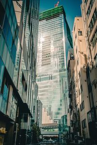 Low angle view of modern buildings against sky