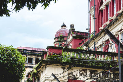 Cinematic shot of an old building in the streets of rangoon, myanmar