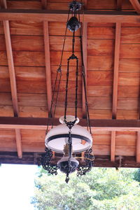 Low angle view of swing hanging on ceiling