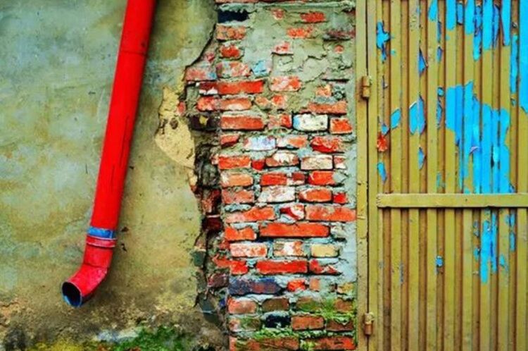 red, built structure, architecture, wall - building feature, metal, weathered, old, abandoned, building exterior, blue, safety, rusty, obsolete, day, no people, damaged, run-down, wall, deterioration, protection