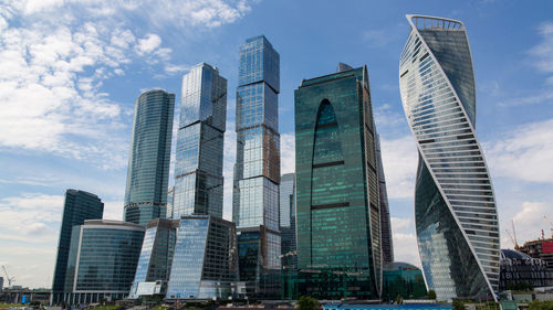 Low angle view of modern buildings against sky