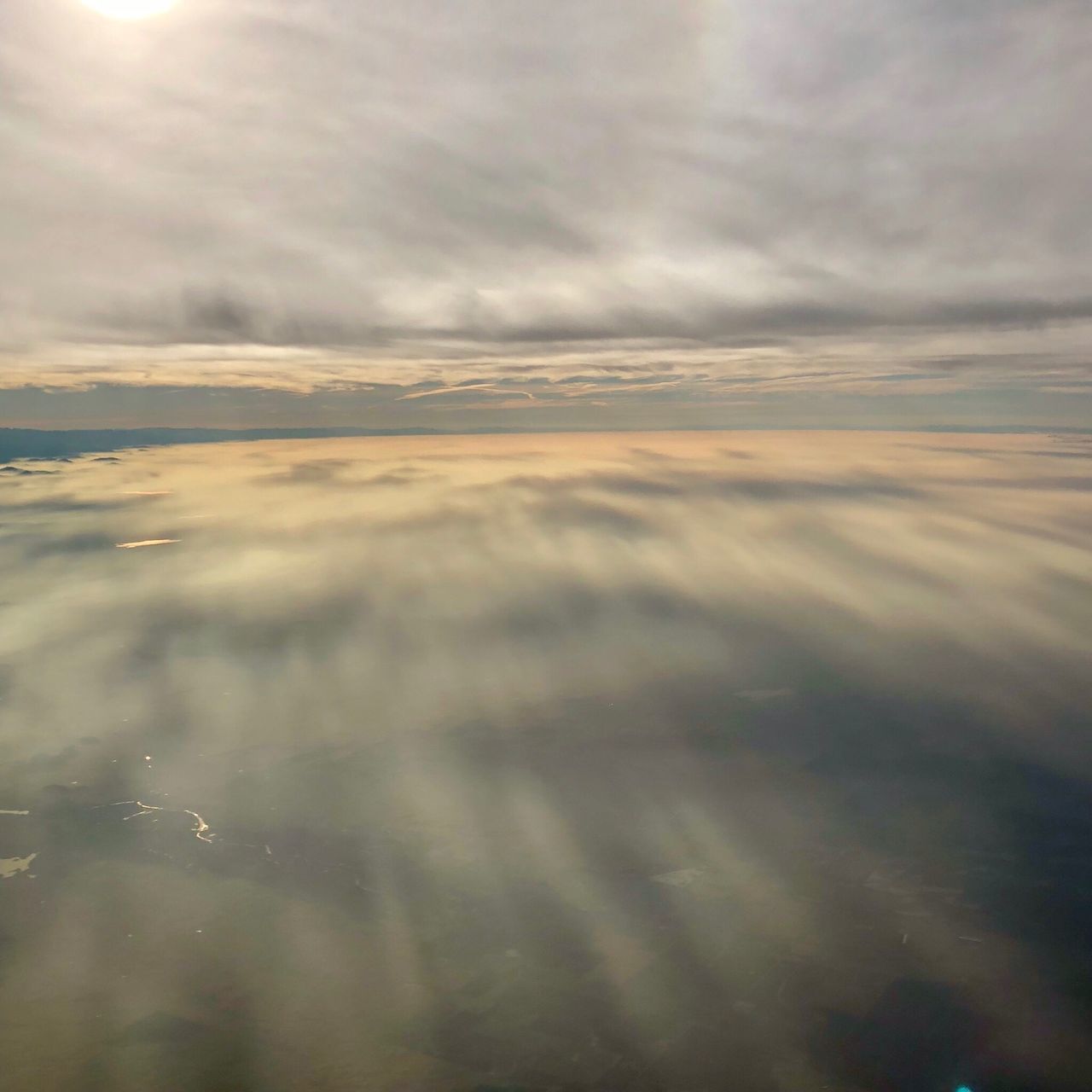 AERIAL VIEW OF CLOUDS OVER SEA