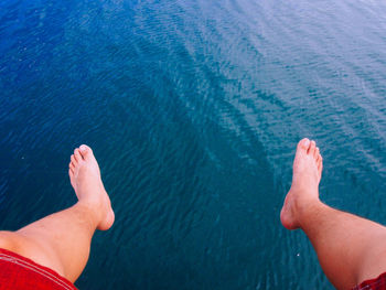 Low section of people in sea