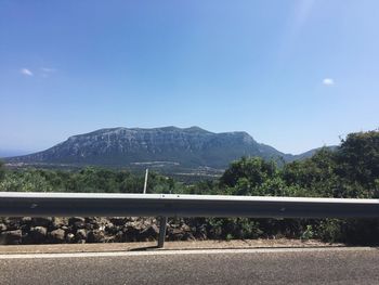 Landscape with mountain range in background