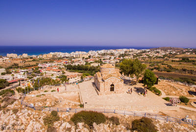 View of cityscape against clear sky