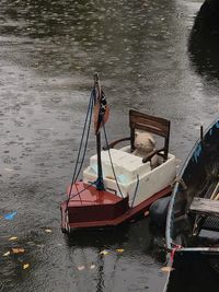 High angle view of fishing boat moored in lake