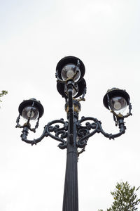 Low angle view of street light against clear sky