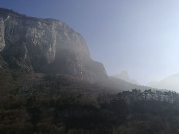 Scenic view of rocky mountains against clear sky