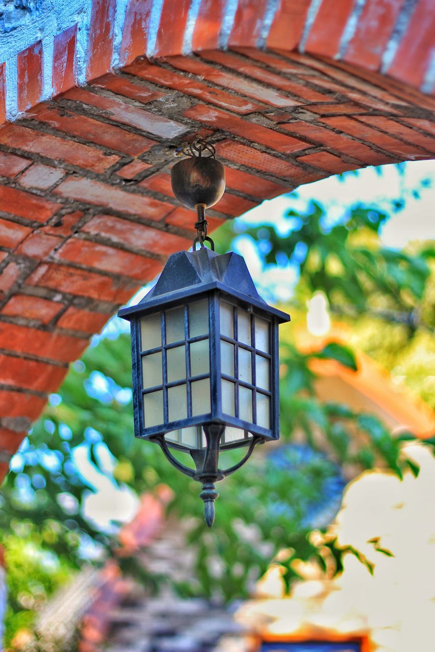 LAMP POST ON ROOF OF HOUSE