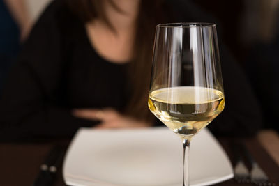 Close-up of wine glass on table