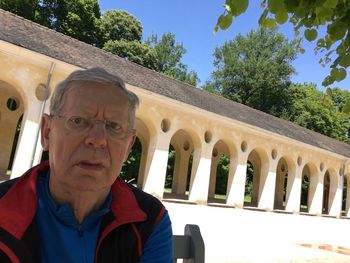 Portrait of man against built structure