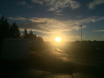 Scenic view of landscape against sky during sunset