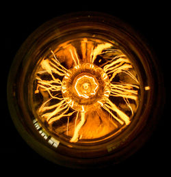 Close-up of illuminated light bulb