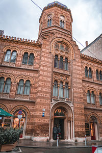 Low angle view of historic building against sky