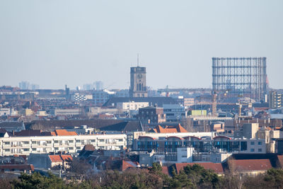 High angle view of buildings against clear sky