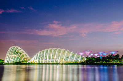 Illuminated ferris wheel at night