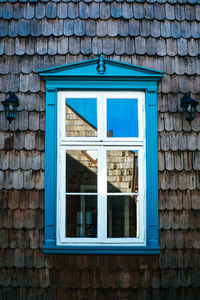 Blue window of old building