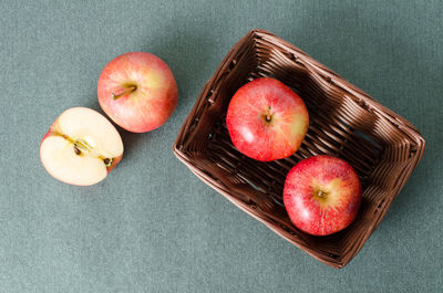 High angle view of fruits and apple on plate