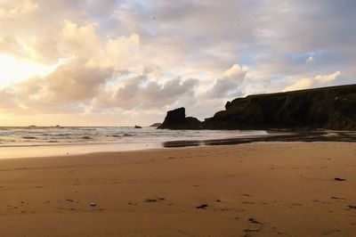 Scenic view of beach against sky