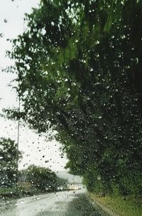 Water drops on glass window of rainy season