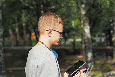 Pilot drone. a young man controls a drone. photo and video aerial photography. high quality photo