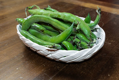 High angle view of vegetables in basket on table