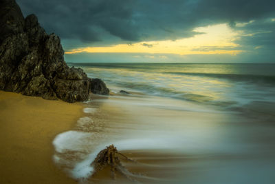 Scenic view of sea at sunset