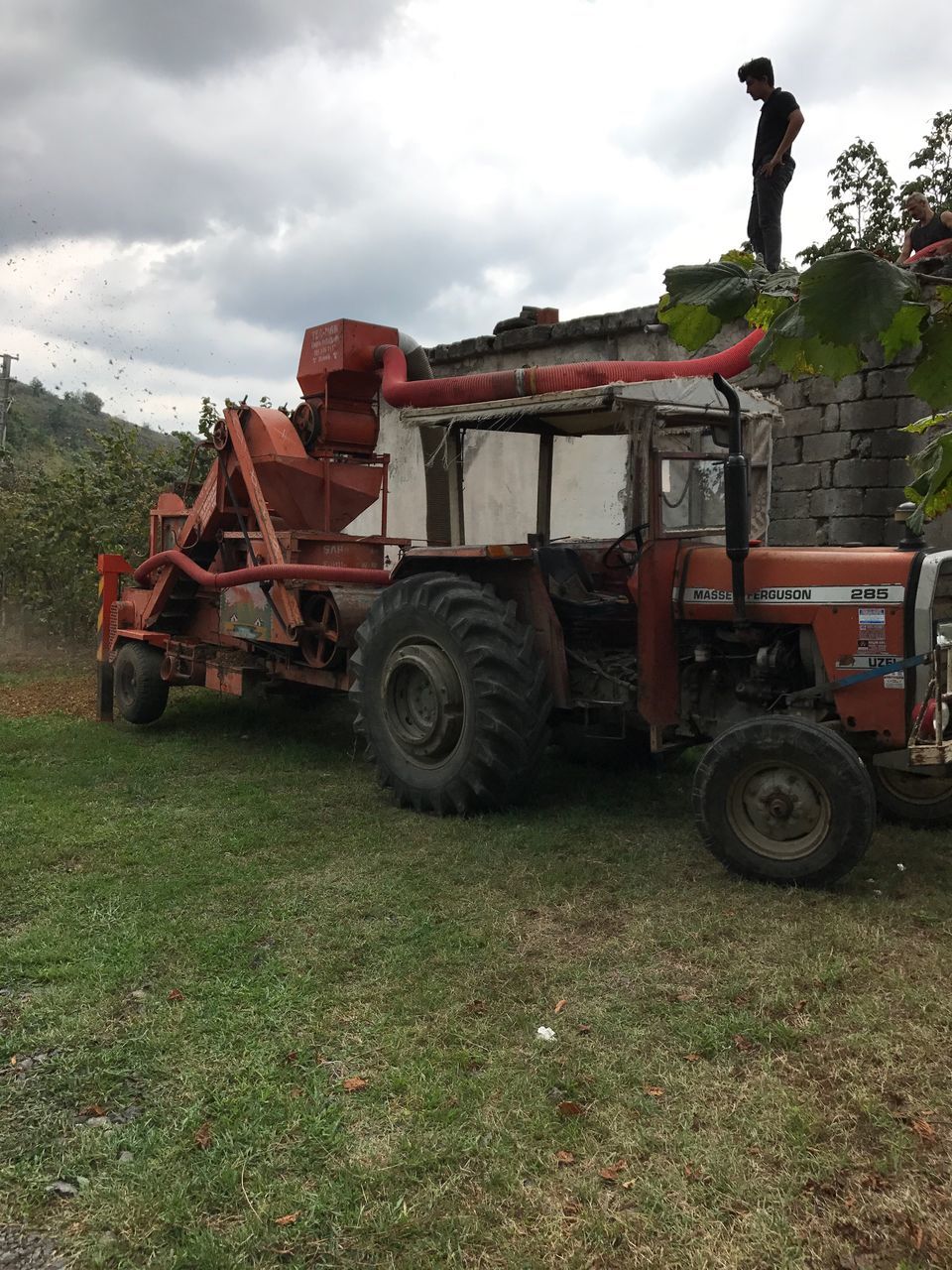 land vehicle, transportation, field, sky, day, mode of transport, outdoors, cloud - sky, no people, grass, stationary