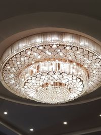 Low angle view of illuminated ceiling