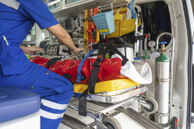 Midsection of people working in bus