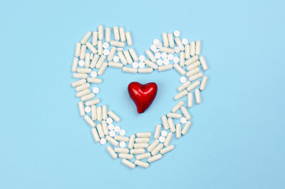 Close-up of heart shape against blue background