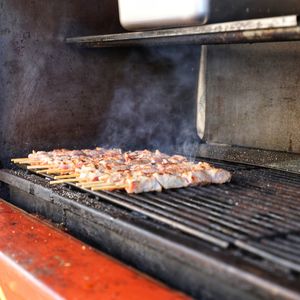 Close-up of meat on barbecue grill