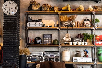 Antique objects on shelves at home