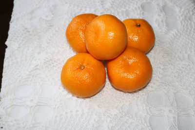 High angle view of orange fruit on table