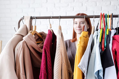 Close-up of clothes hanging on rack