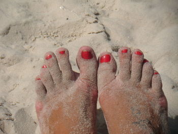 Low section of woman at beach