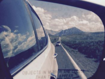 Car on highway against sky