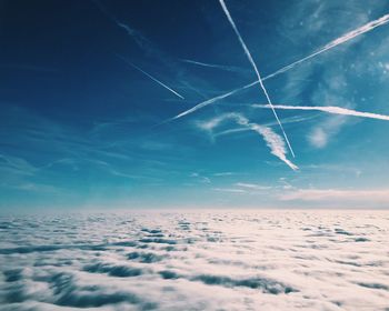 Scenic view of landscape against blue sky