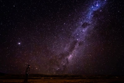 Scenic view of star field against sky