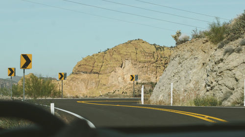 Road seen through car windshield