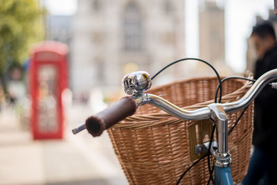 Close-up of bicycle in basket on street