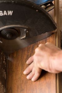 Close-up of man working on wood