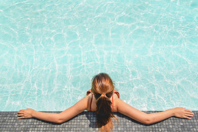 Woman in swimming pool