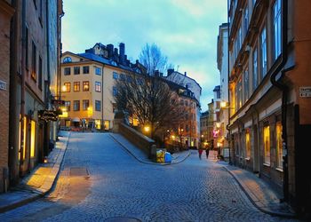 Street in city during winter at night